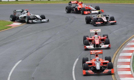 Timo Glock var i godt selskab - og leverede blandt andet end kontra-overhaling på Michael Schumacher
